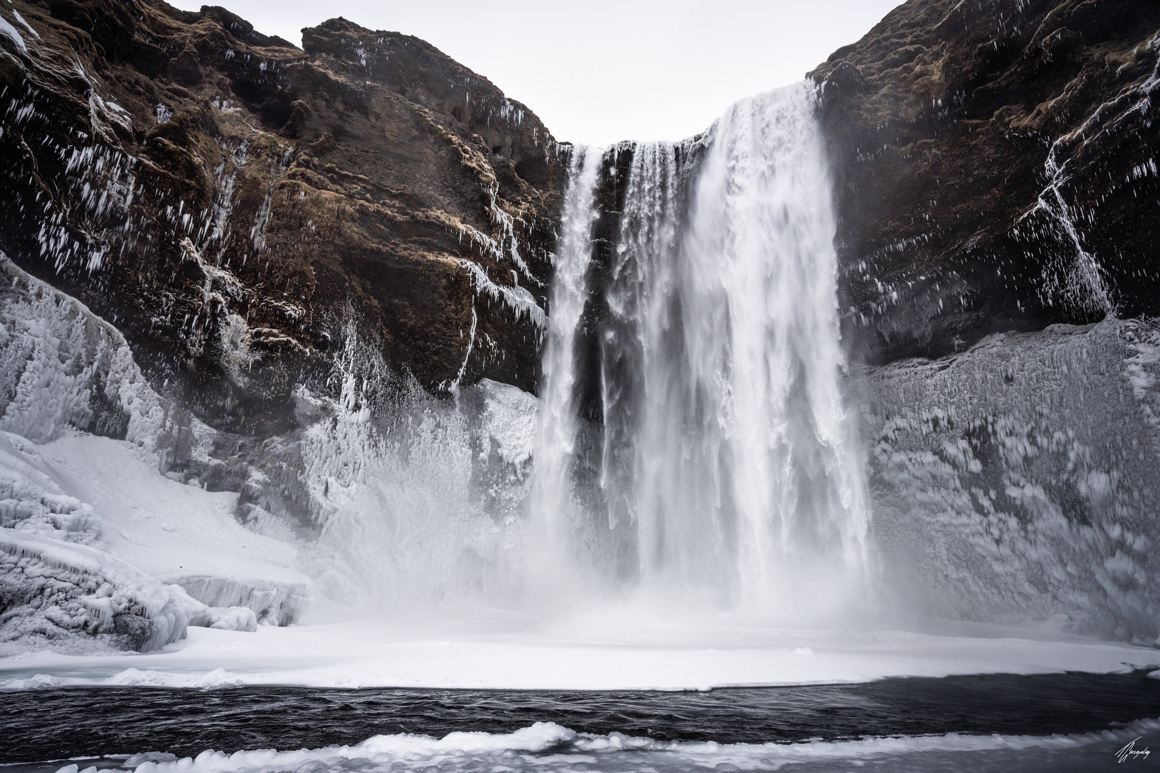 Skogafoss waterfall in Iceland winter landscape wall decor print powerful flow with calm atmosphere perfect for iceland travel inspiration or gift